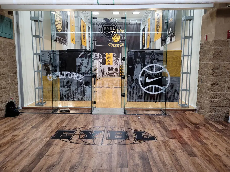 Hanging Banners, Vinyl Cut Wall and Floor Graphics produced by IAC for Taylor / Nike