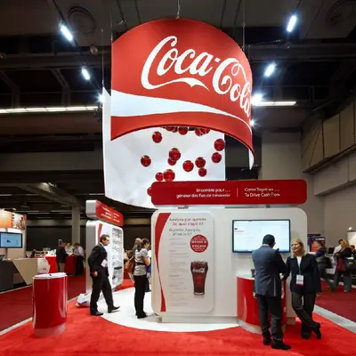 Hanging Halo with stretch fabric and Rigid Signage produced by IAC for Taylor / Coca Cola