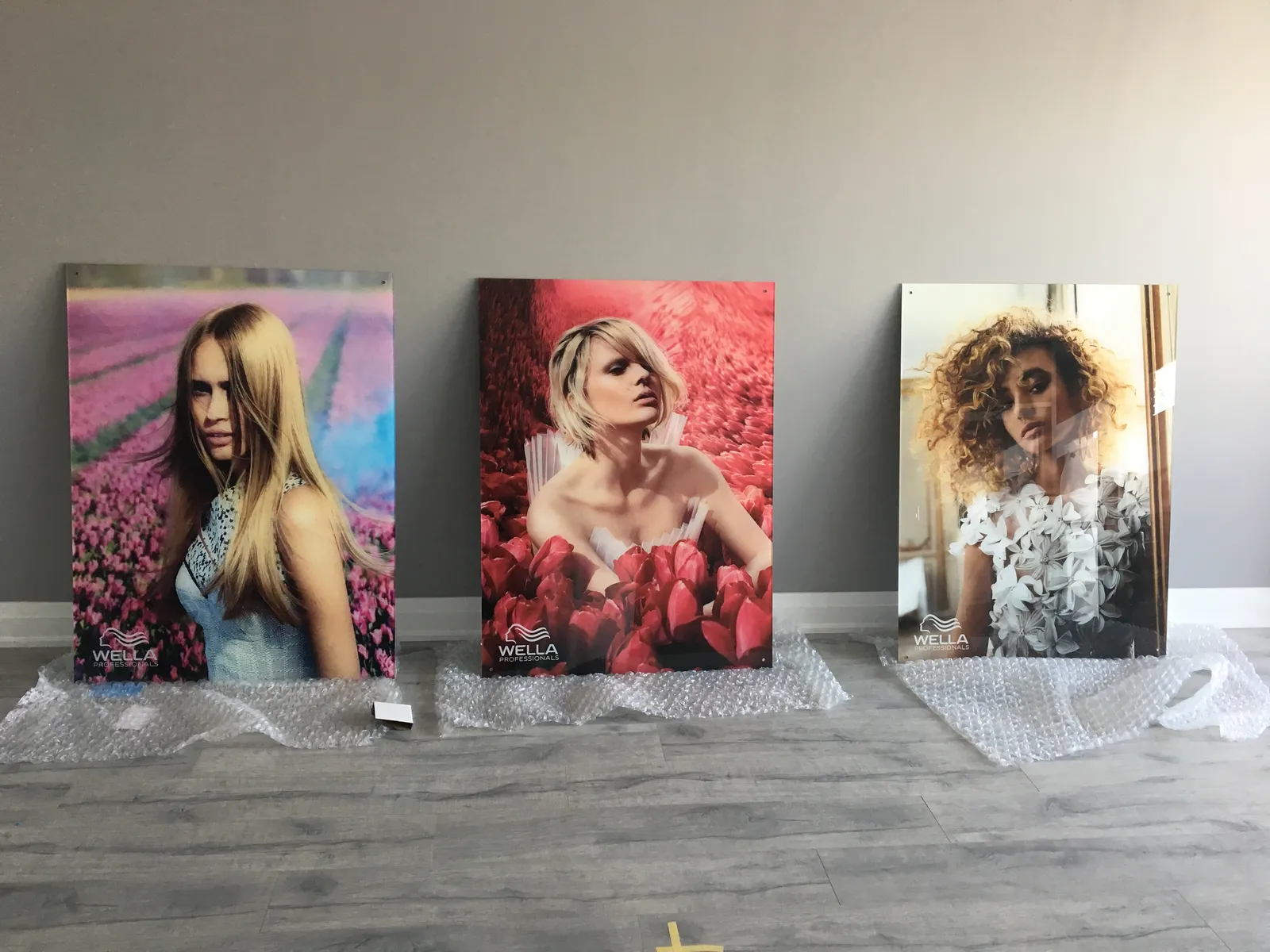 Wella Acrylic 1 — rigid signage produced and installed by IAC, Toronto